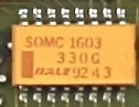 Picture of a Surface Mount, gull-wing, 16 pin Resistor Package mounted on a PWB