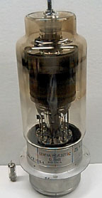 compares a large thyratron vacuum tube to a normal size vacuum tube